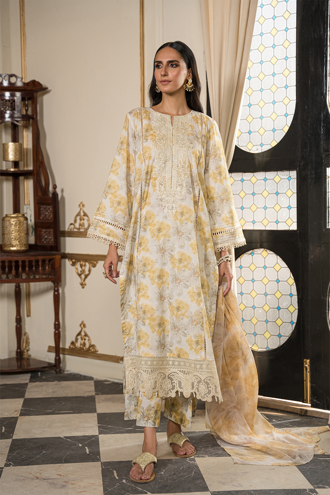 3 piece embroidered cambric suit for ladies in Pakistan